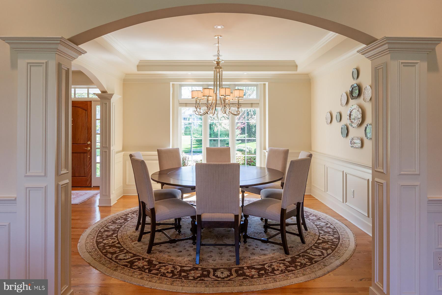801 Greenside Drive Lititz, PA 17543 - Photo 24 of 57 a dining room with furniture a chandelier and wooden floor