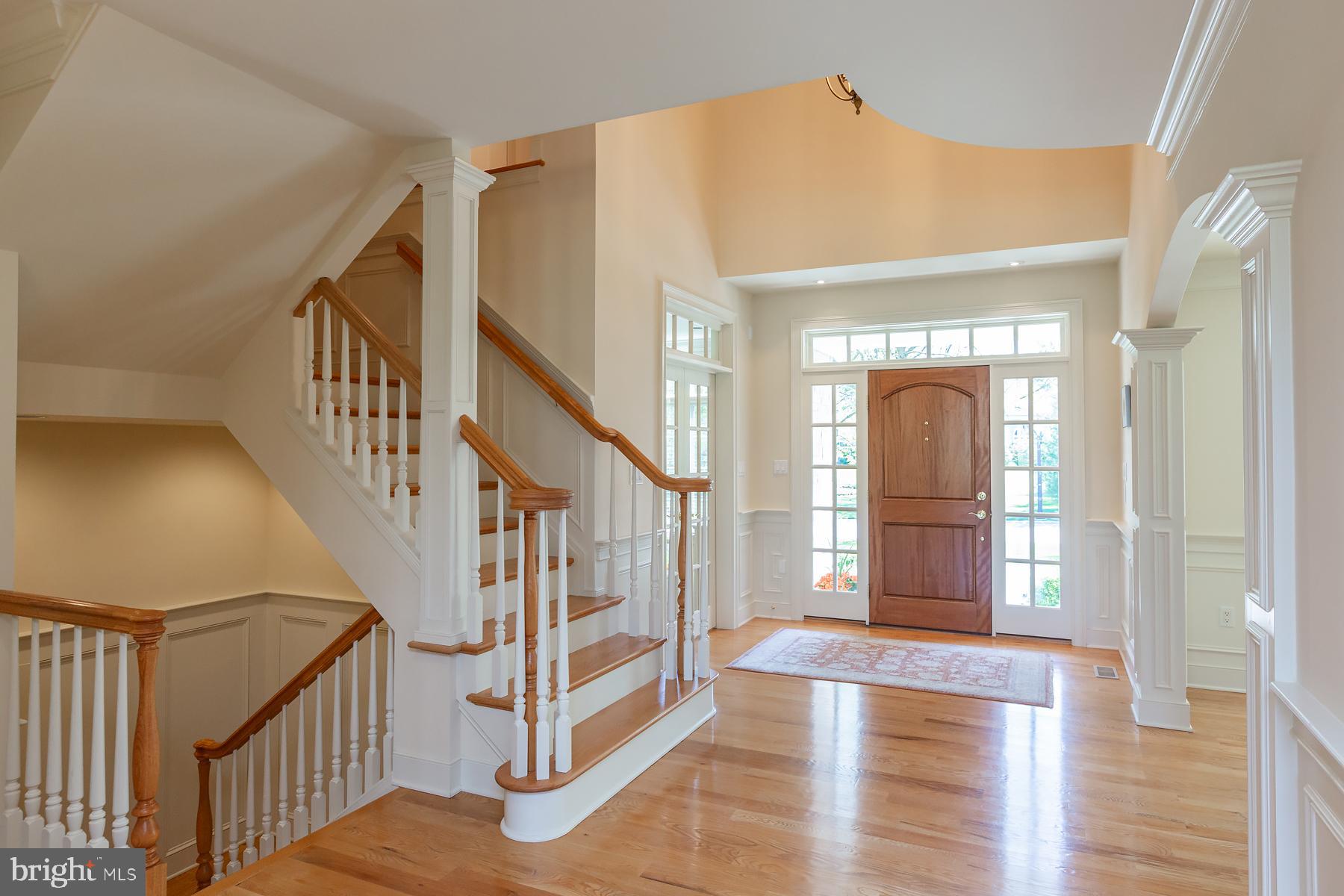 801 Greenside Drive Lititz, PA 17543 - Photo 33 of 57 a view of staircase with lots of frames on wall and a chandelier