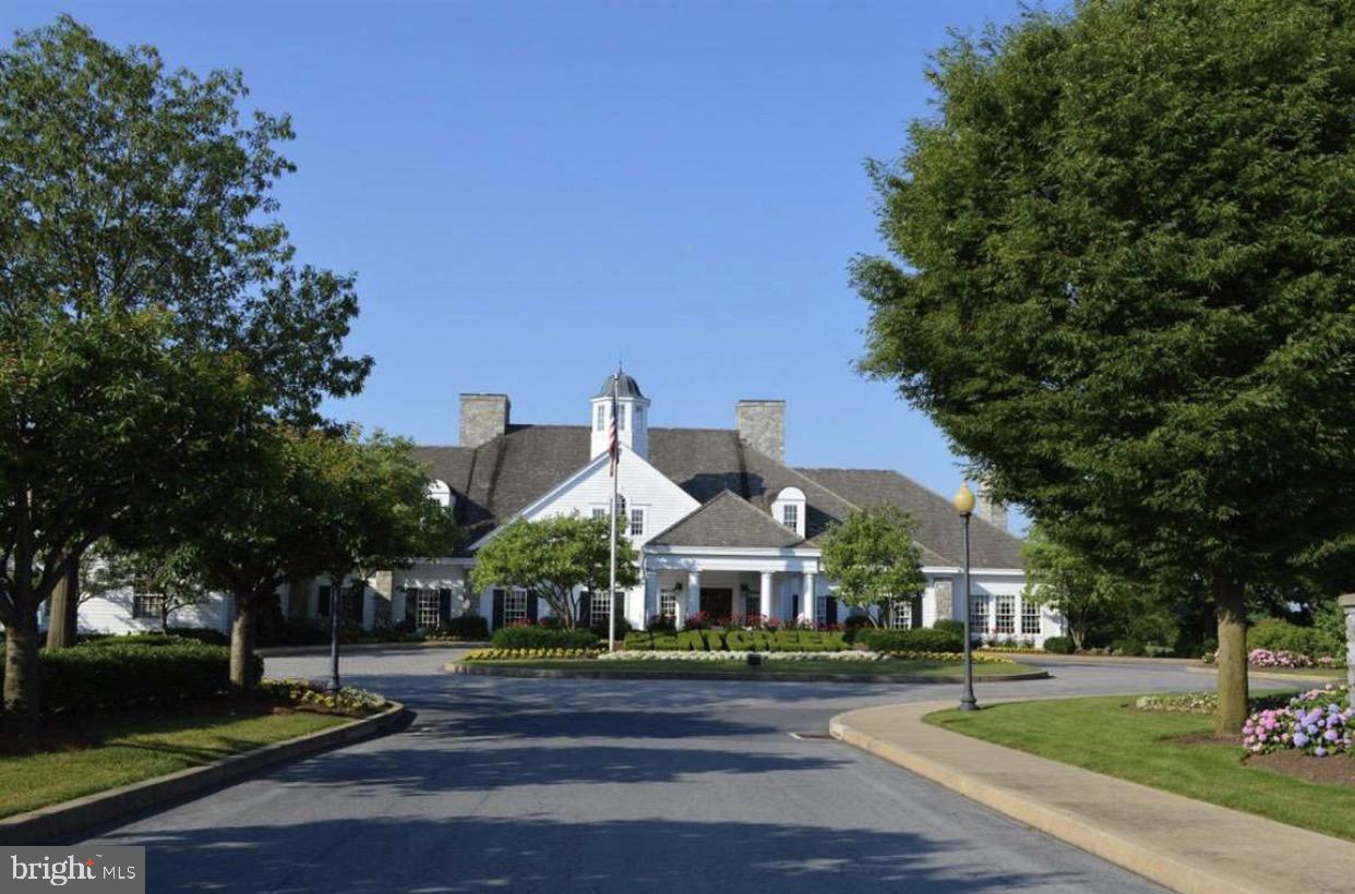 801 Greenside Drive Lititz, PA 17543 - Photo 54 of 57 a view of a big building in front of a big yard with large trees