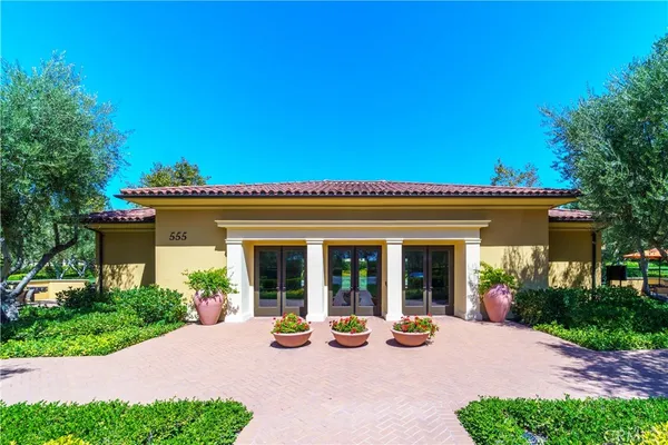 a view of a house with garden and porch