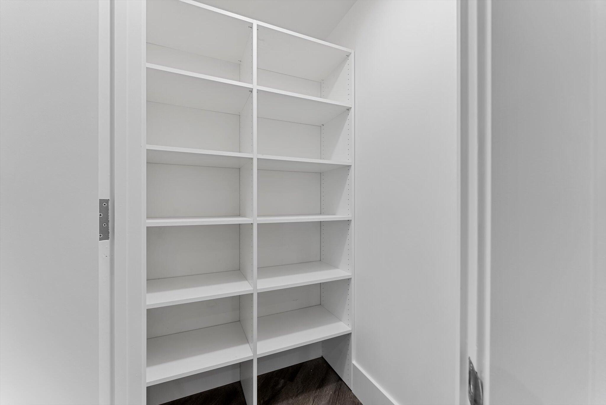 455 East Palmetto Park Road, Unit 6E Boca Raton, FL 33432 - Photo 17 of 28 a view of walk in closet with empty racks