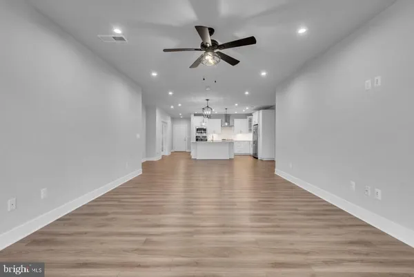 a view of room with floor to ceiling window