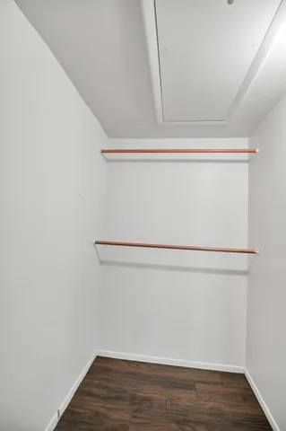 a view of an empty walk in closet