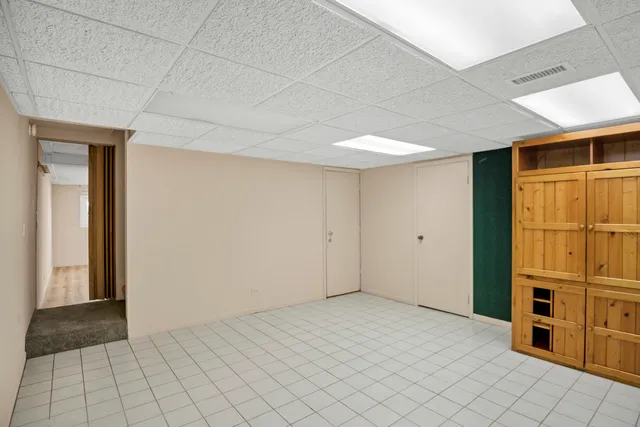 a view of a livingroom with a refrigerator