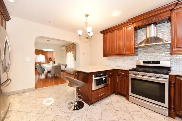 a kitchen with a stove and a sink