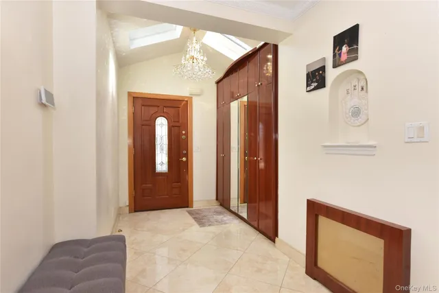 a view of a hallway with front door