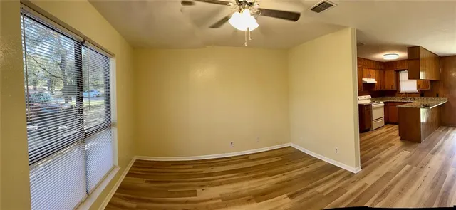 a white refrigerator freezer sitting inside of a kitchen