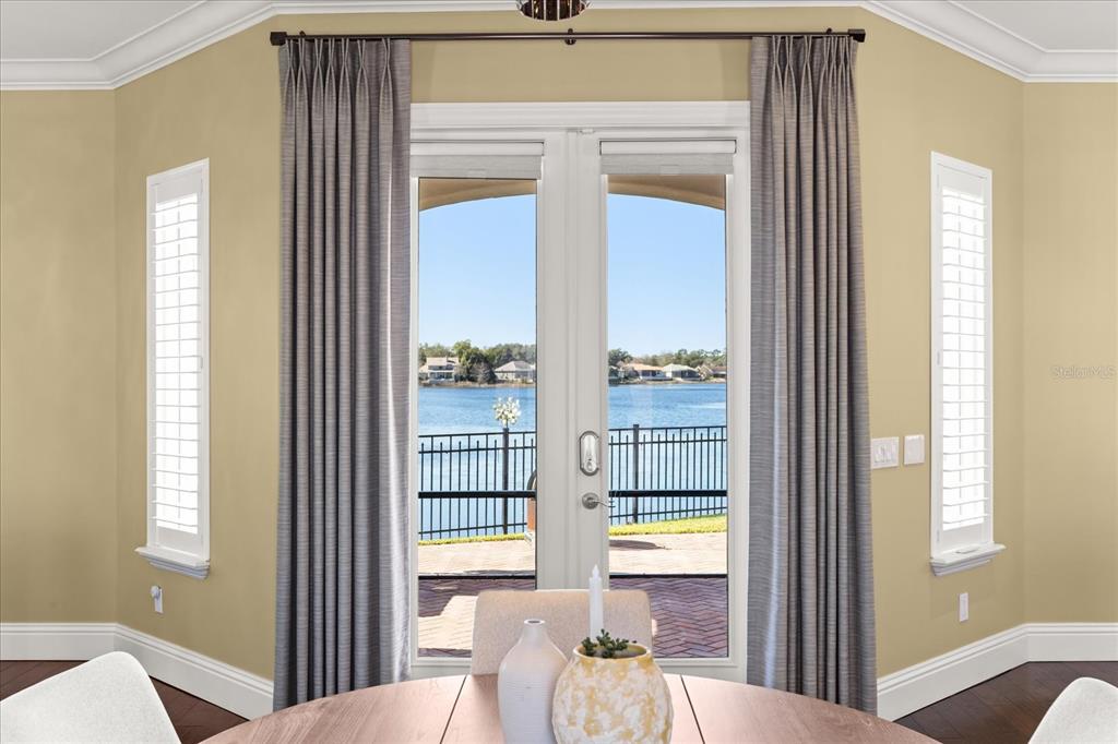812 Stephens Pass Cove Lake Mary, FL 32746 - Photo 16 of 60 a view of a bedroom with a large window