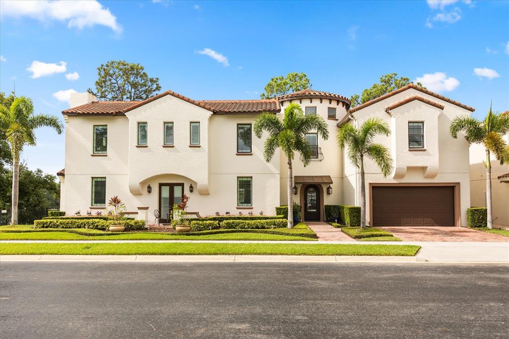 812 Stephens Pass Cove Lake Mary, FL 32746 - Photo 2 of 60 a view of white house with a swimming pool