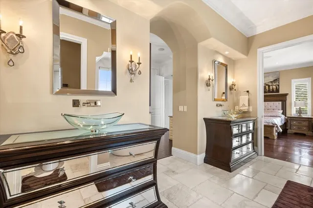 a view of hall way with furniture