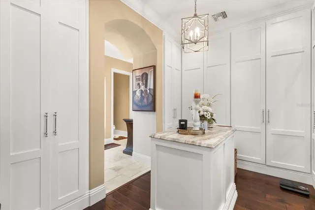 a view of a balcony with furniture