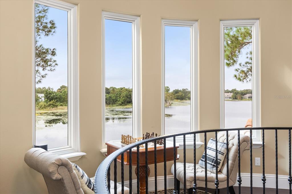 812 Stephens Pass Cove Lake Mary, FL 32746 - Photo 37 of 60 a view of a balcony with furniture