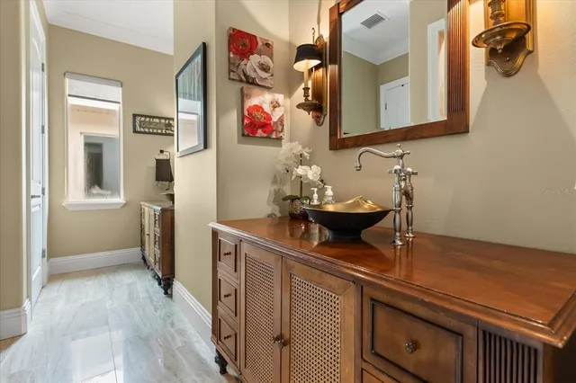 a living room with furniture rug and window