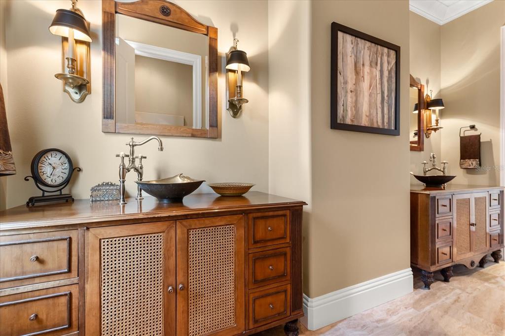 812 Stephens Pass Cove Lake Mary, FL 32746 - Photo 50 of 60 a bathroom with a sink and a mirror