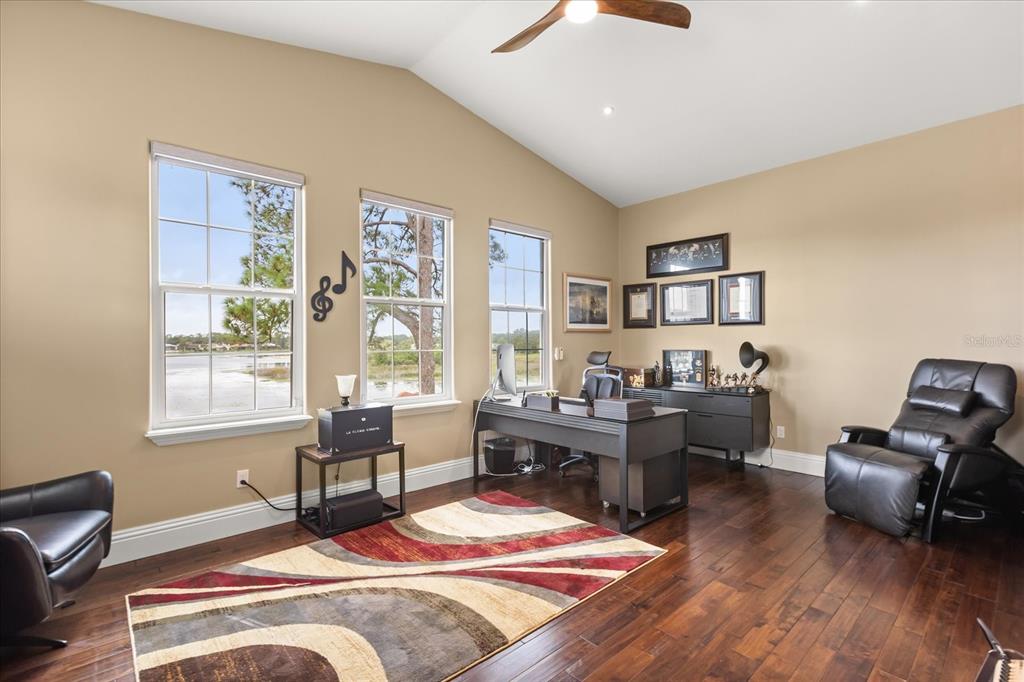 812 Stephens Pass Cove Lake Mary, FL 32746 - Photo 53 of 60 a living room with furniture rug and window