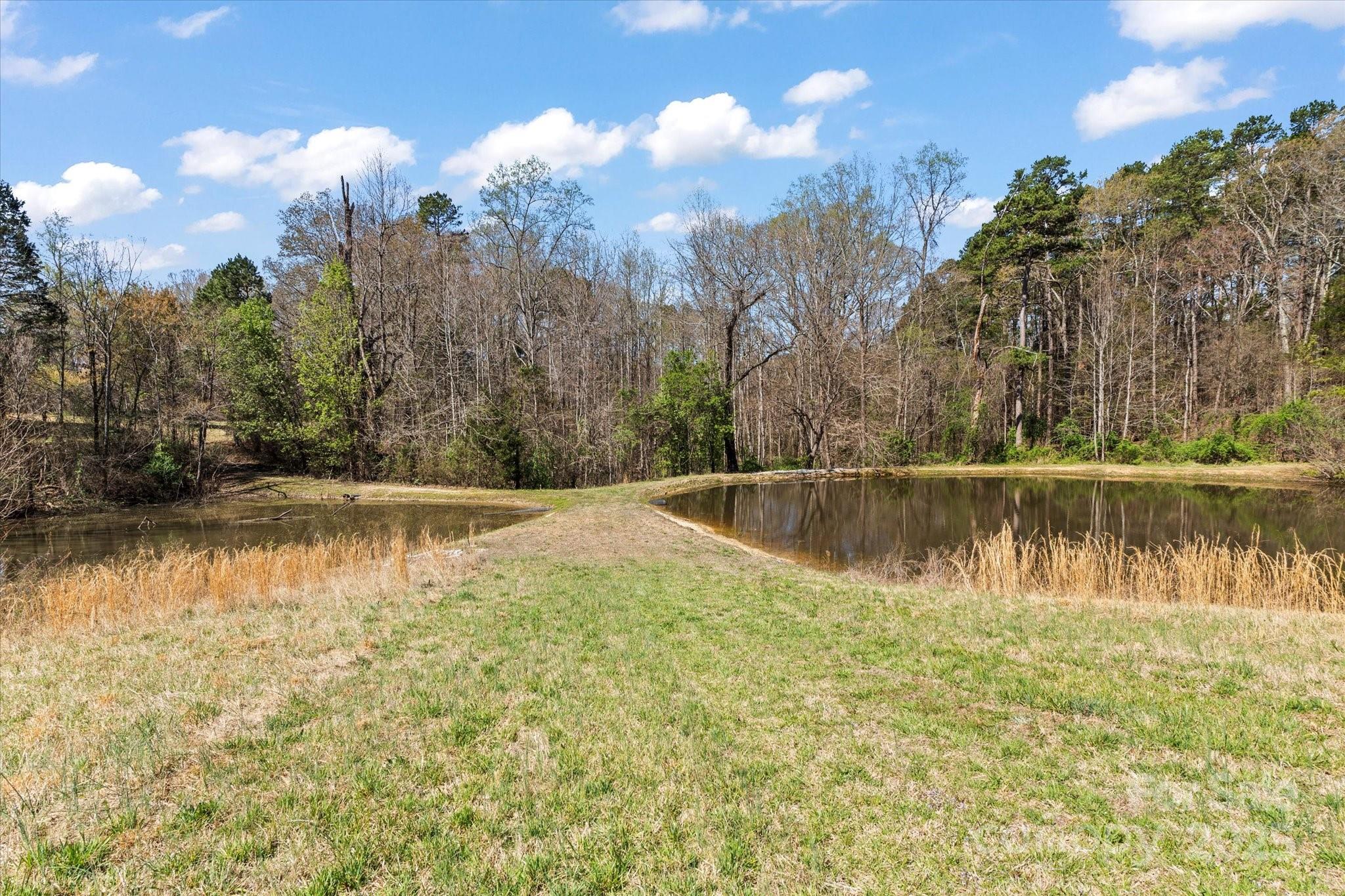 1030 Hurley School Road Salisbury, NC 28147 - Photo 38 of 48 a view of lake view with mountain and trees in the background