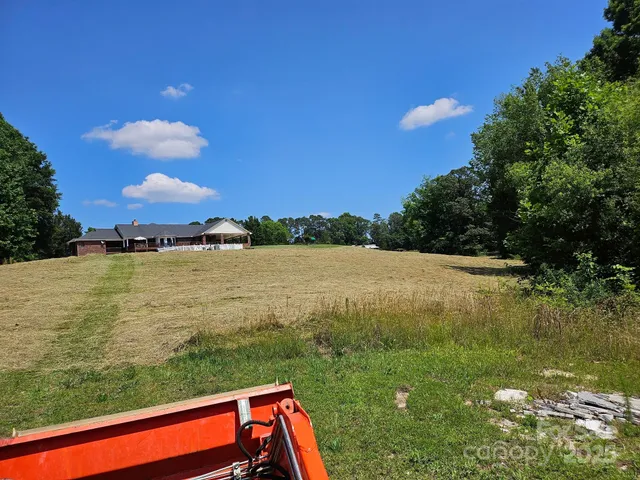 a view of a golf course with a lake