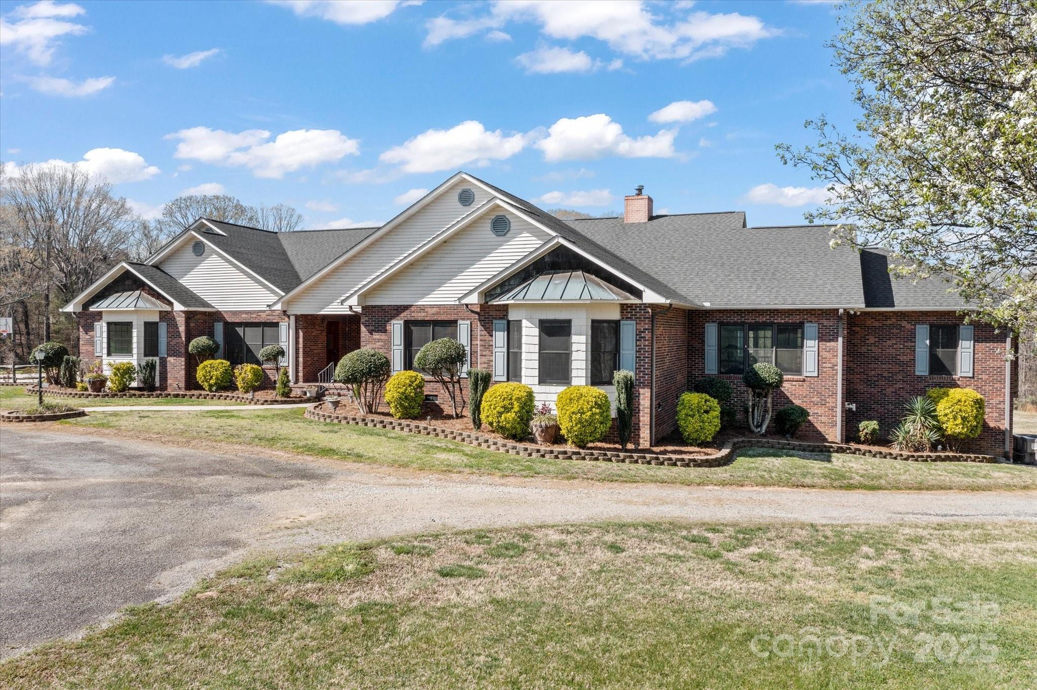 1030 Hurley School Road Salisbury, NC 28147 - Photo 5 of 48 a front view of a house with a yard