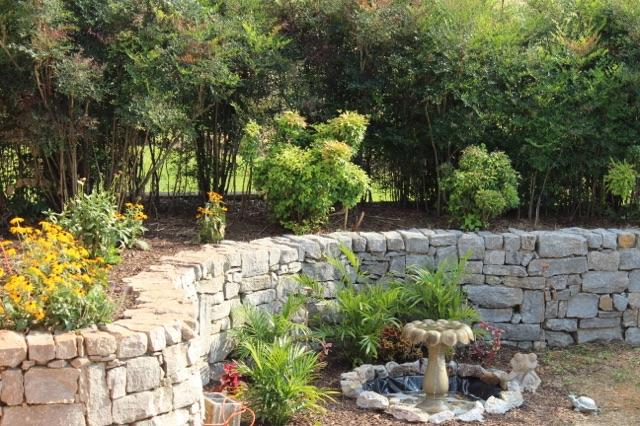 259 Martin Road Bon Aqua, TN 37025 - Photo 4 of 20 Beautiful landscaping and rock wall!