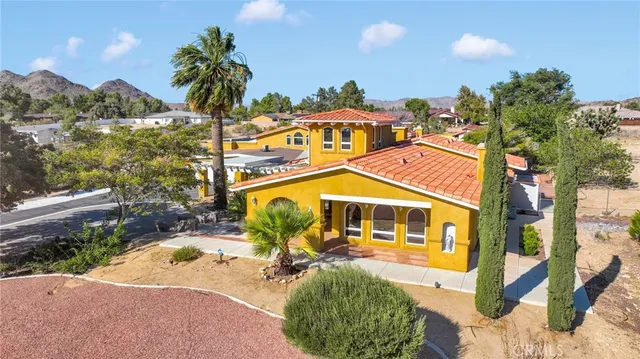 a view of a house with a swimming pool