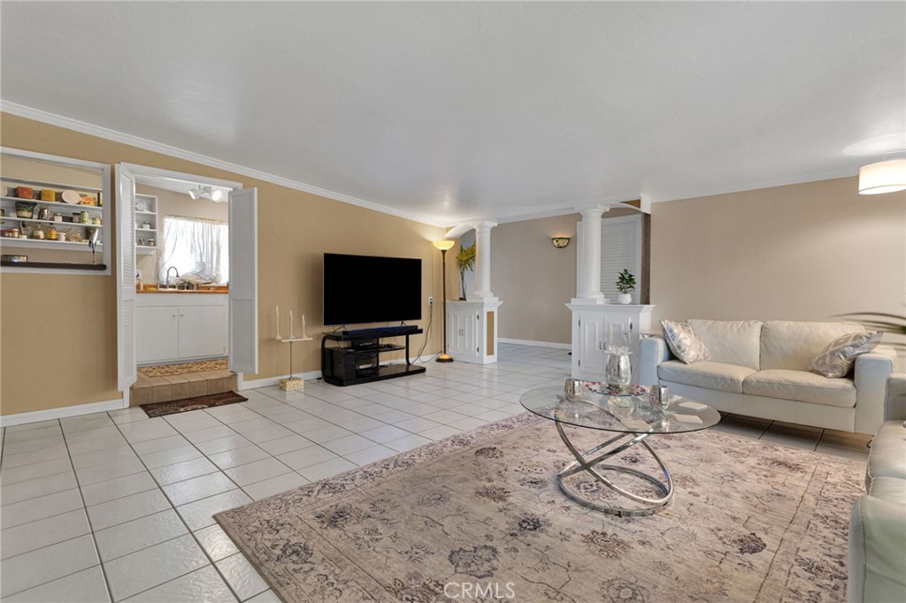 15023 Genesee Road Apple Valley, CA 92307 - Photo 26 of 61 a living room with furniture and a flat screen tv