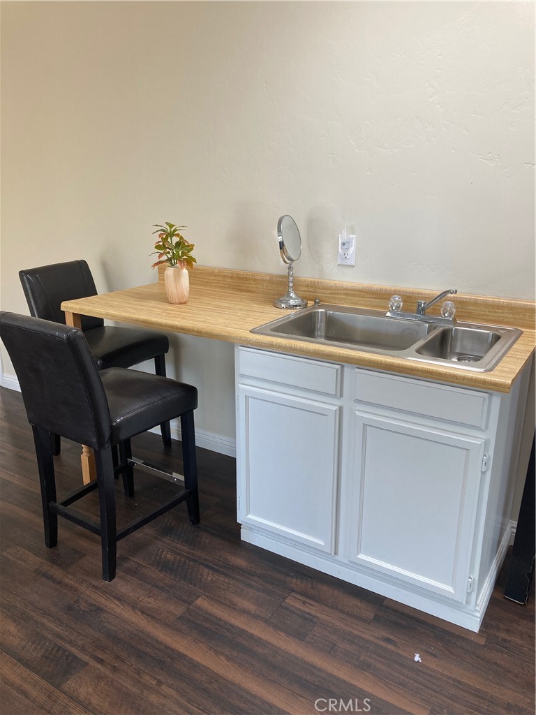 15023 Genesee Road Apple Valley, CA 92307 - Photo 33 of 61 a bathroom with a sink and a mirror