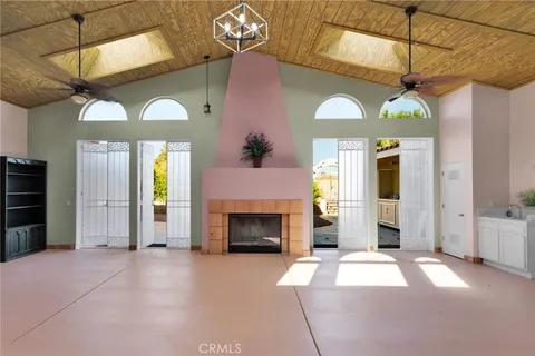 a house with swimming pool in front of it