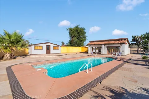 a front view of a house with a patio