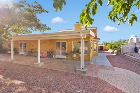 a front view of a house with a outdoor space