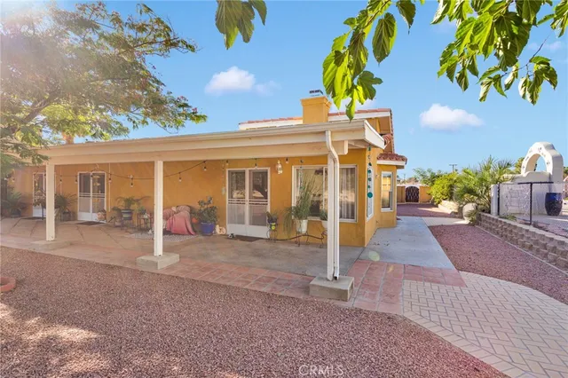 a front view of a house with a outdoor space