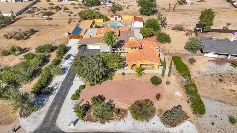 a view of a backyard of the house
