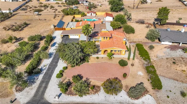 a view of a backyard of the house