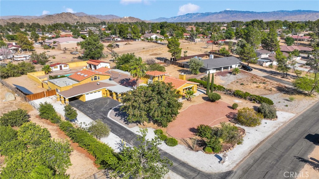 15023 Genesee Road Apple Valley, CA 92307 - Photo 58 of 61 an aerial view of residential houses and outdoor space