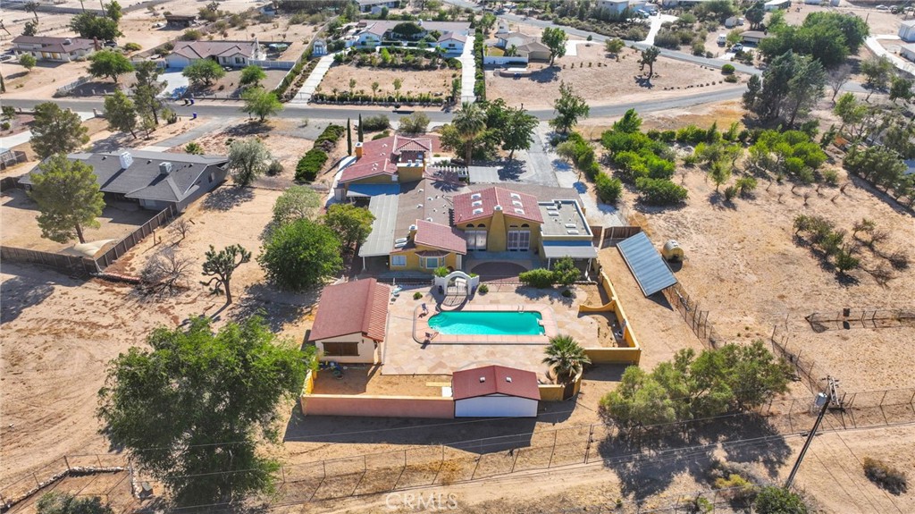 15023 Genesee Road Apple Valley, CA 92307 - Photo 59 of 61 an aerial view of residential houses with outdoor space