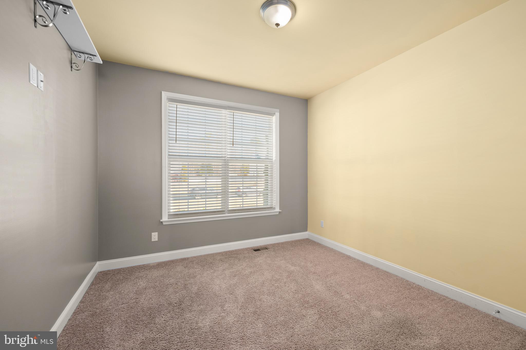 33057 Short Road Lewes, DE 19958 - Photo 18 of 40 an empty room with a window