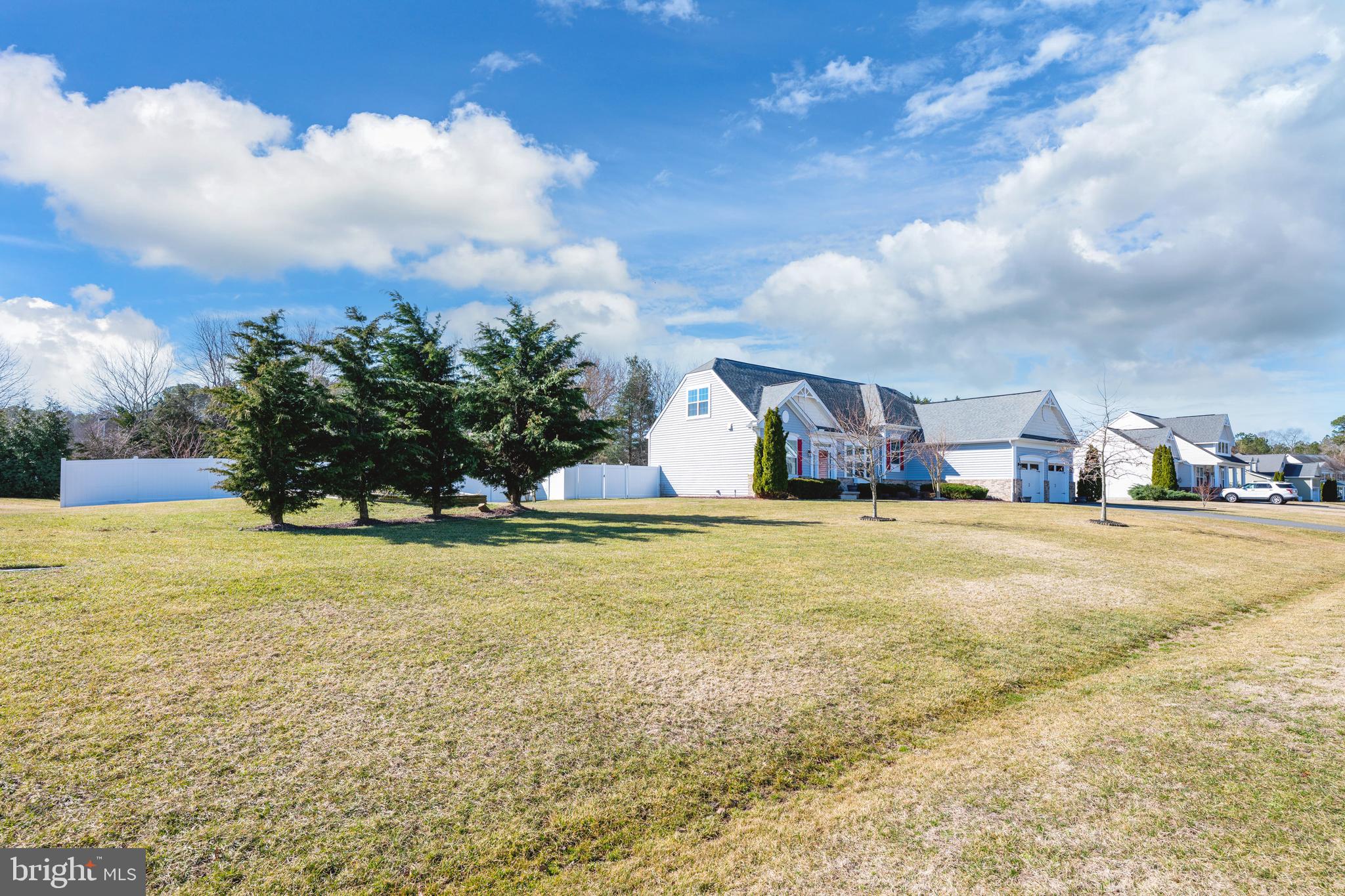 33057 Short Road Lewes, DE 19958 - Photo 2 of 40 a swimming pool with an ocean view