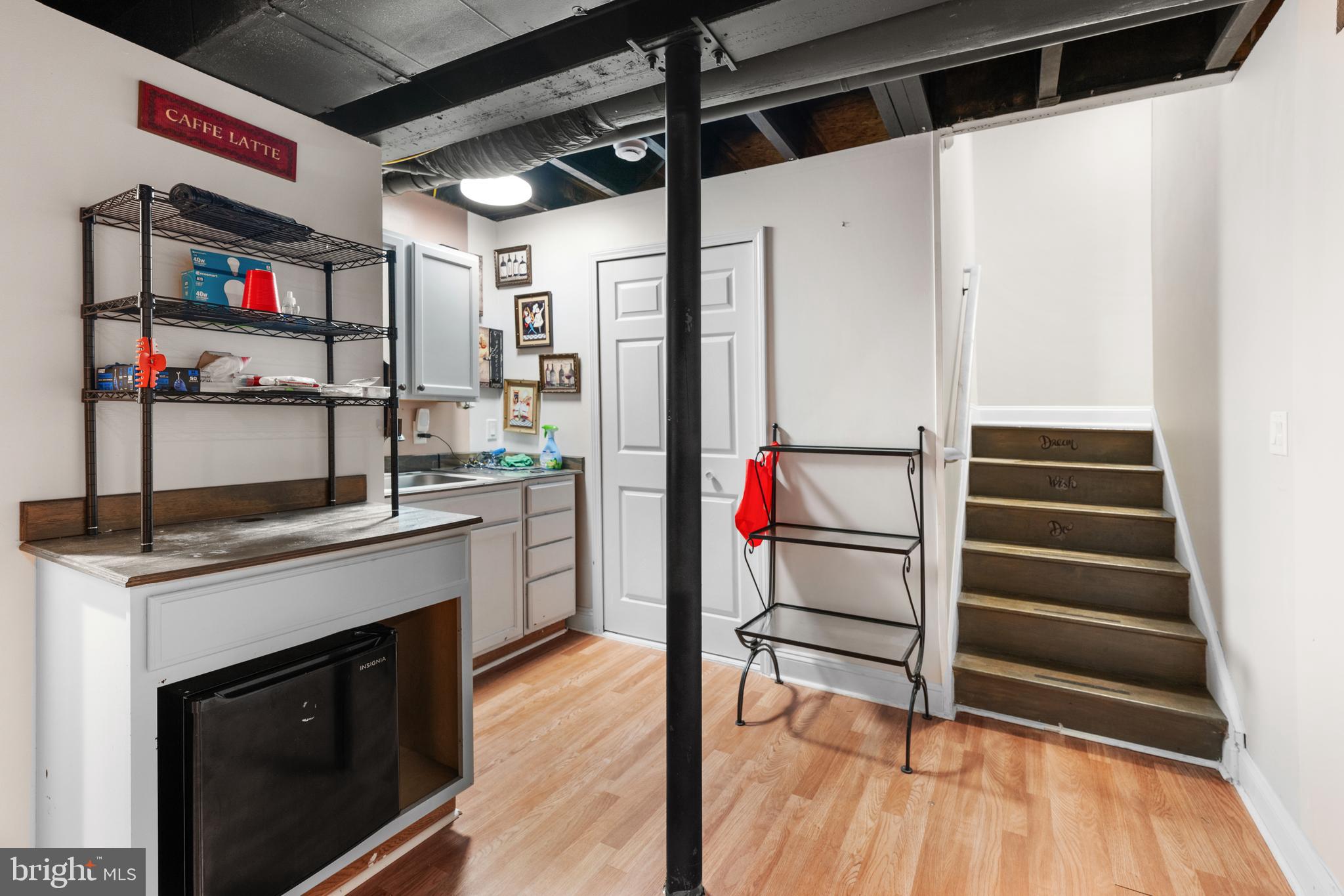 33057 Short Road Lewes, DE 19958 - Photo 28 of 40 a kitchen with stainless steel appliances granite countertop a stove and a refrigerator