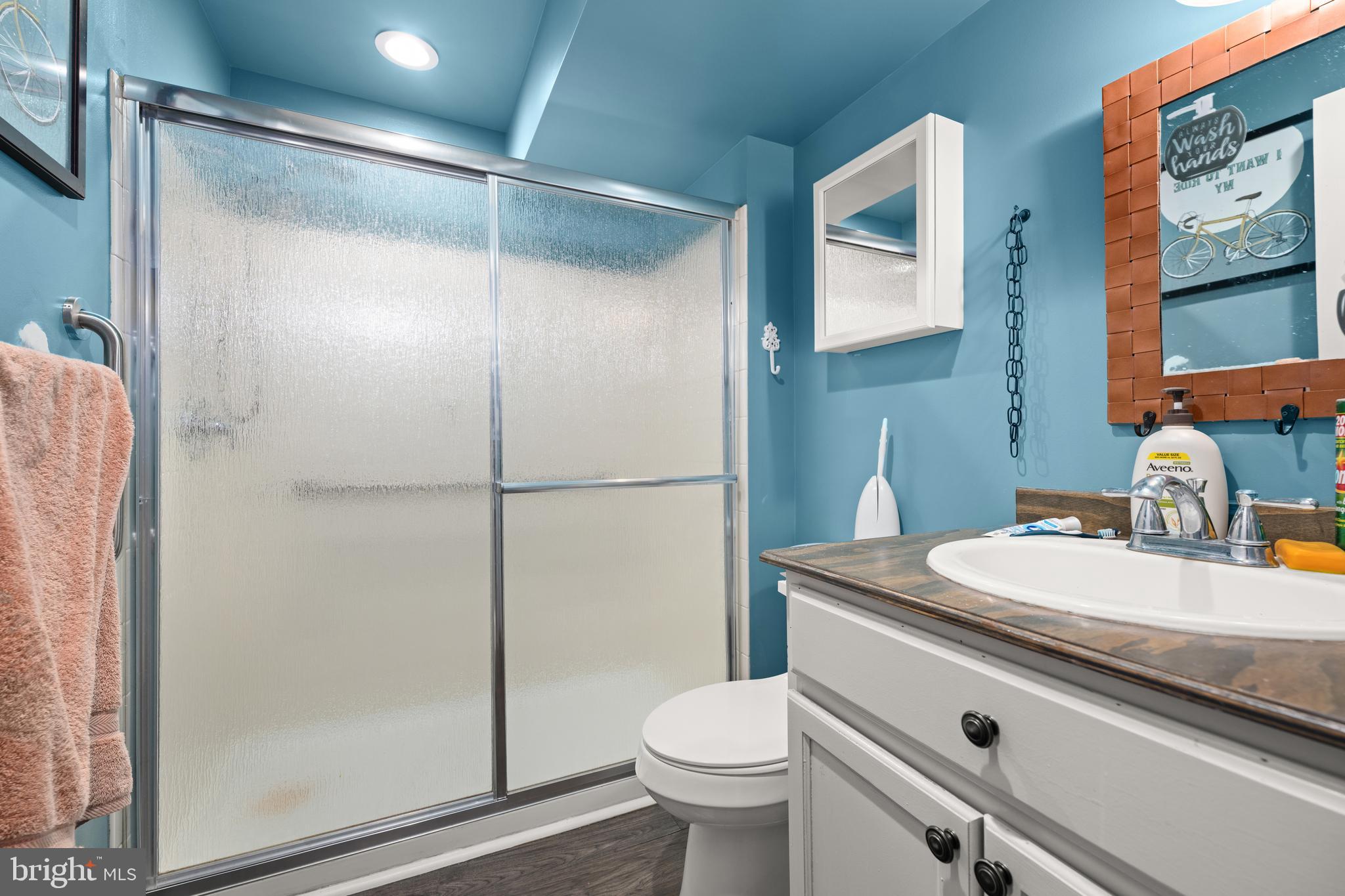 33057 Short Road Lewes, DE 19958 - Photo 29 of 40 a bathroom with a sink toilet and shower