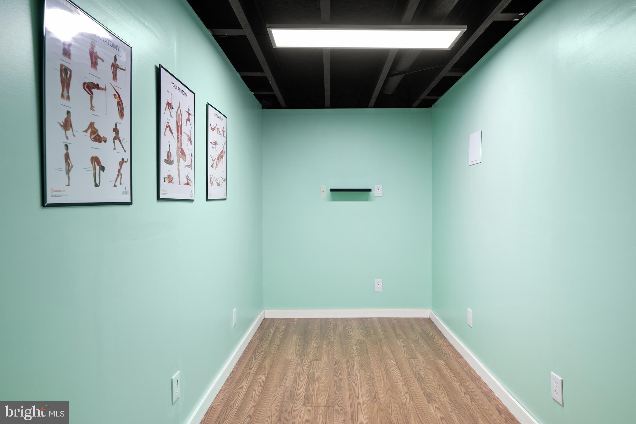 33057 Short Road Lewes, DE 19958 - Photo 30 of 40 a view of an empty room with wooden floor