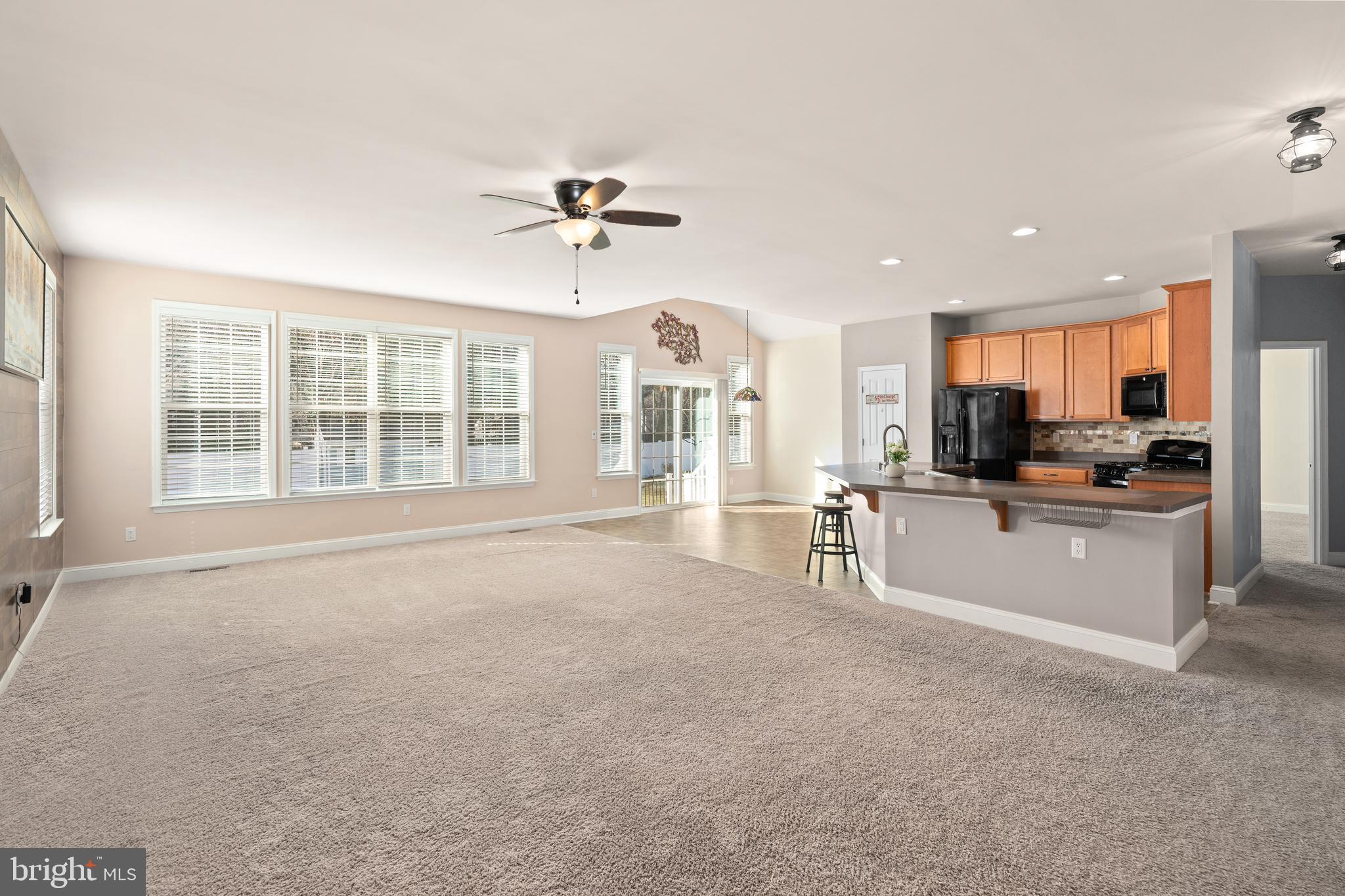 33057 Short Road Lewes, DE 19958 - Photo 40 of 40 a view of a kitchen with refrigerator and a sink