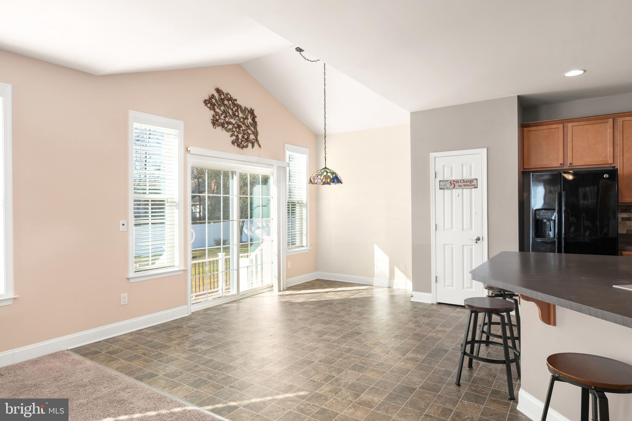 33057 Short Road Lewes, DE 19958 - Photo 8 of 40 a view of livingroom with furniture wooden floor and window