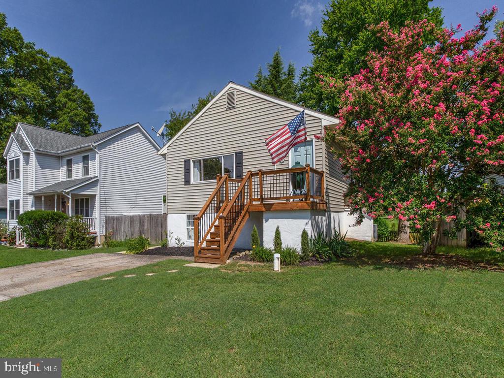 132 Oakwood Road Edgewater, MD 21037 - Photo 3 of 37 a view of a house with a backyard