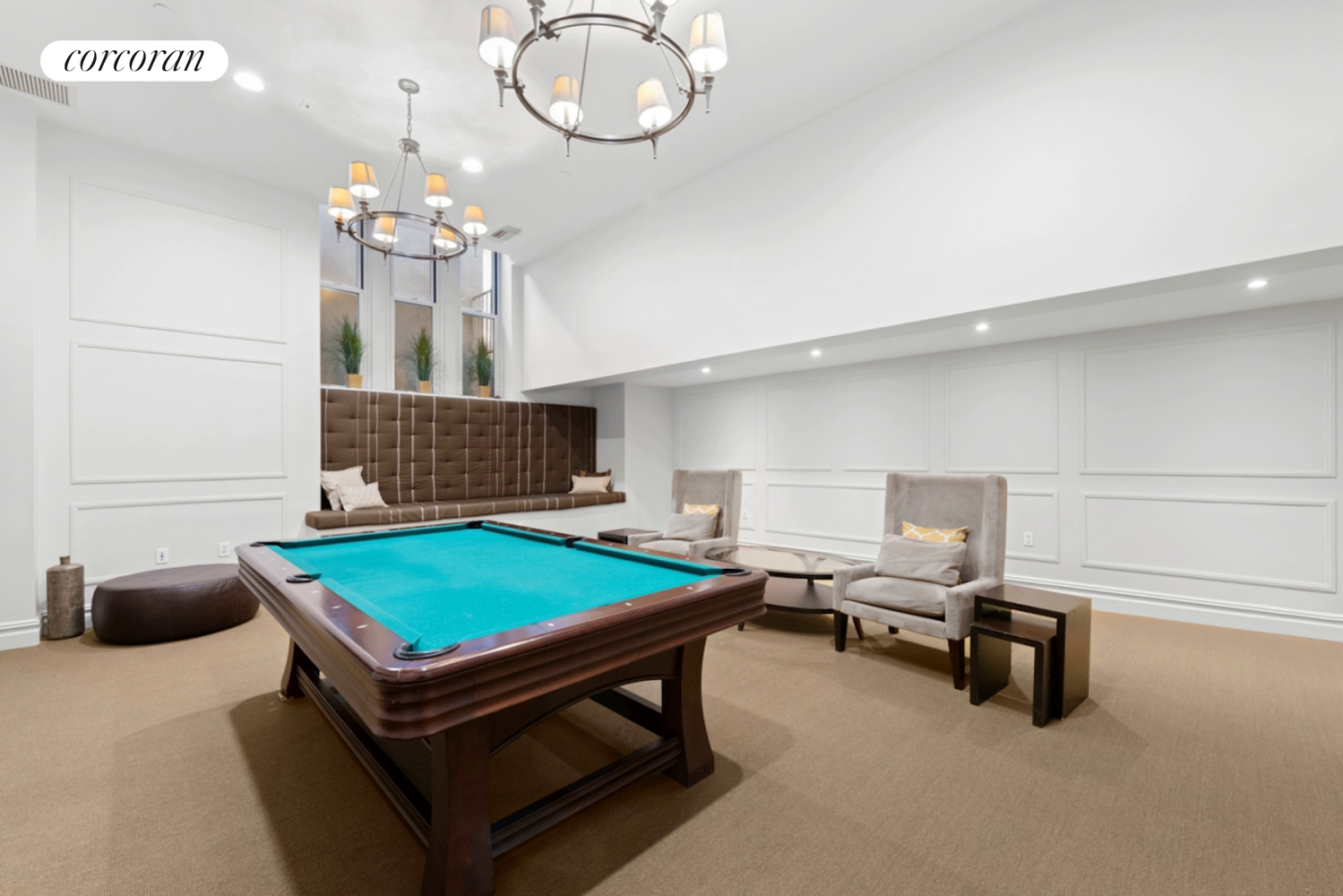 220 West 148th Street, Unit 5M Manhattan, NY 10039 - Photo 17 of 22 a room with pool table and windows