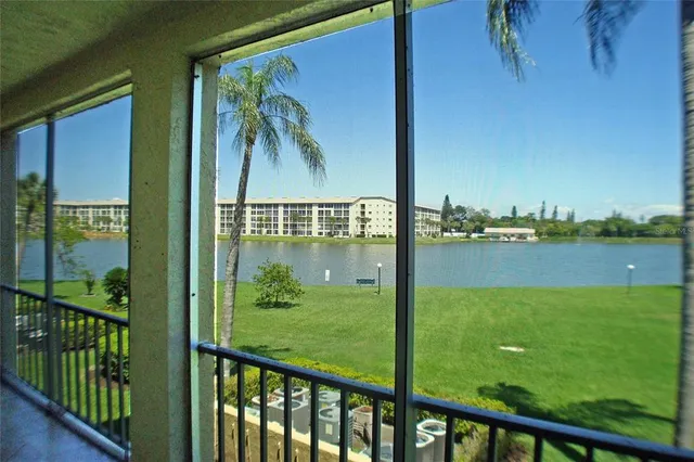 a view of a balcony with ocean view