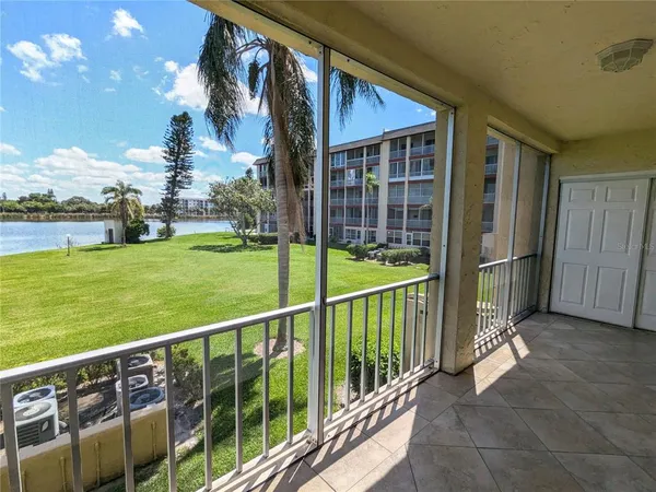 a view of a porch with a yard