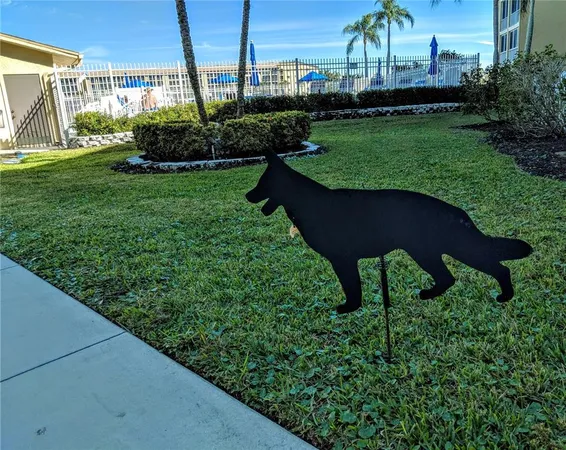 a kitchen with a refrigerator and a stove