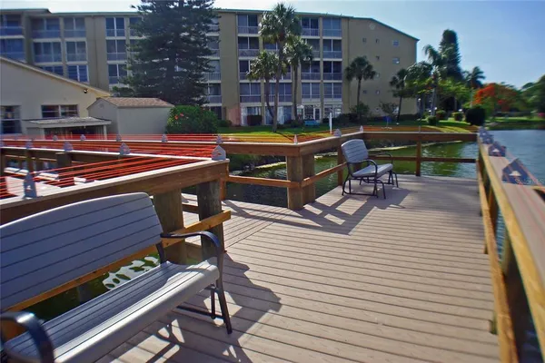 a view of a garden with sitting area