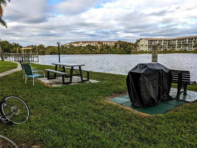 a view of a patio with a yard
