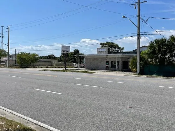 a view of a building with a street