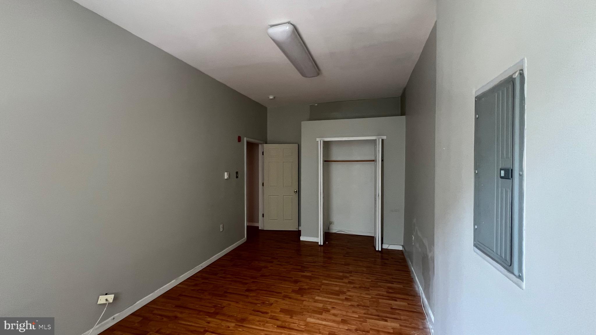 1115 Walnut Street, Unit 2F Philadelphia, PA 19107 - Photo 5 of 14 a view of hallway with wooden floor